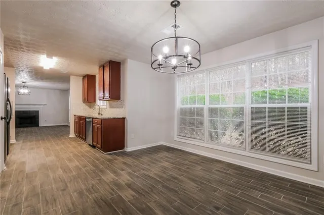 a view of kitchen and windows