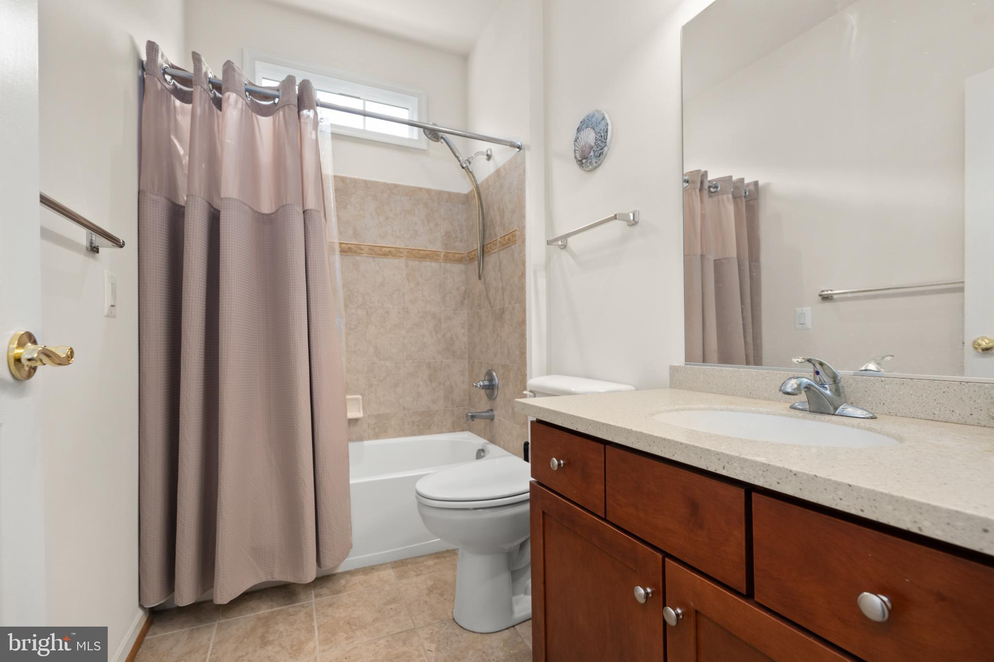 12 Harlequin Loop Bridgeville, DE 19933 - Photo 22 of 47 Modern bathroom with elegant finishes.
