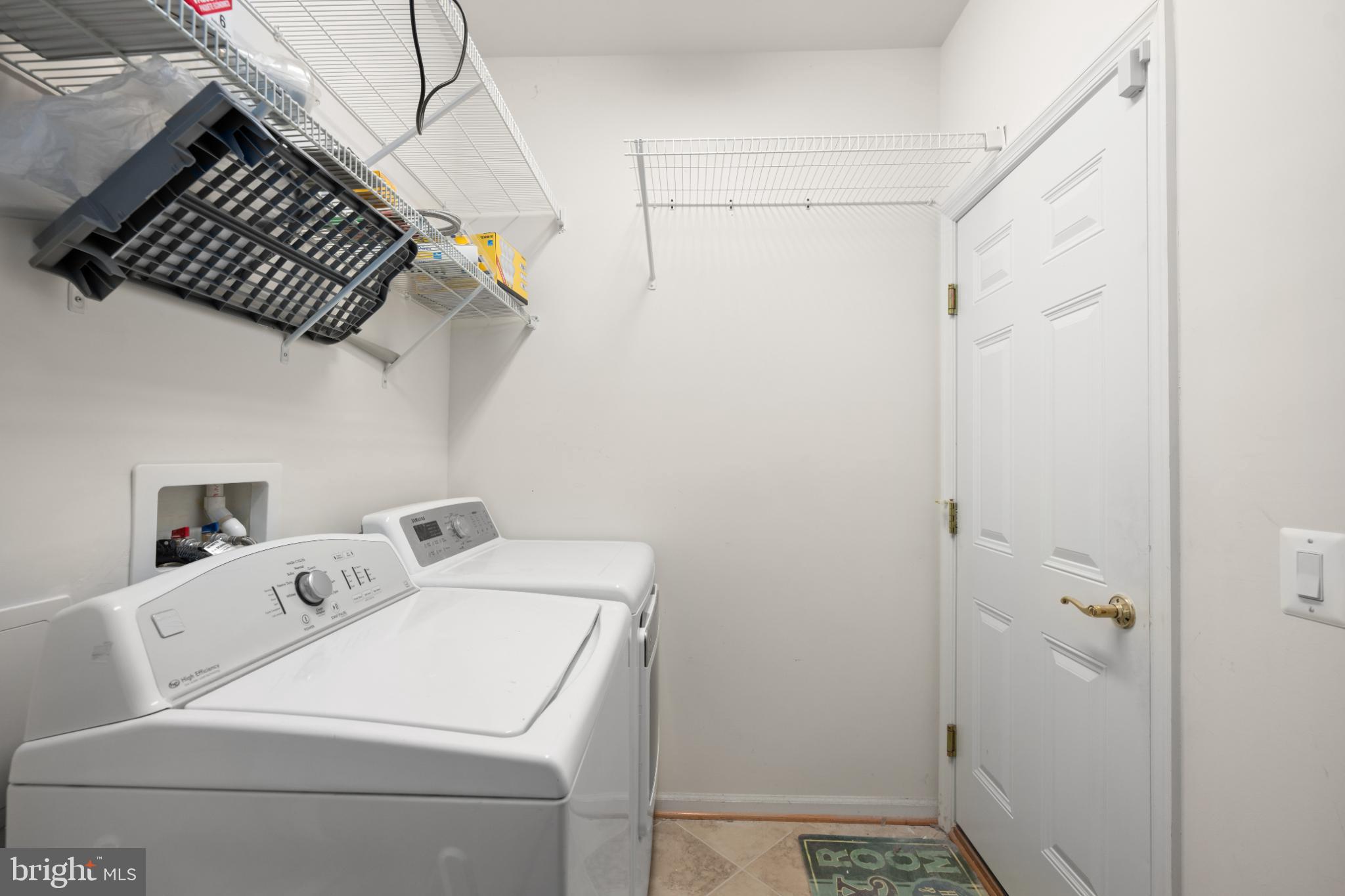12 Harlequin Loop Bridgeville, DE 19933 - Photo 29 of 47 Bright and functional laundry space.