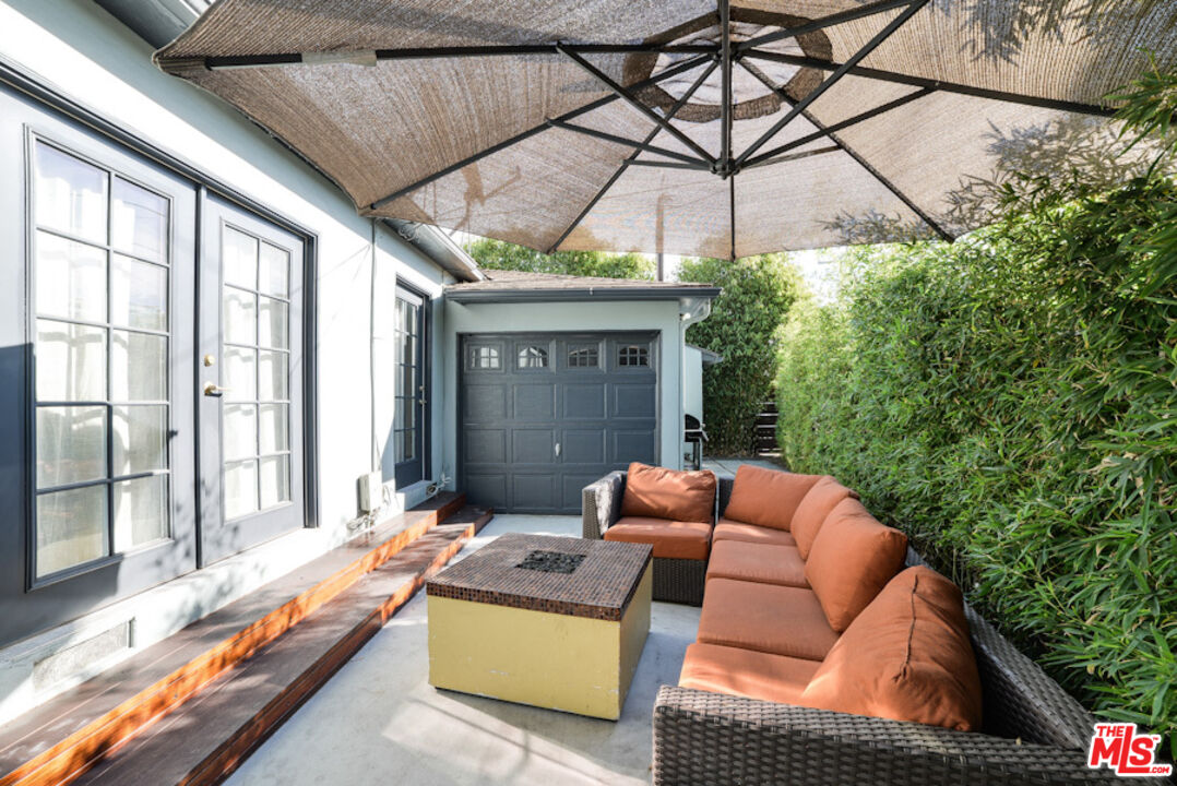 218 Venice Way Venice, CA 90291 - Photo 15 of 17 a outdoor living space with furniture and umbrella