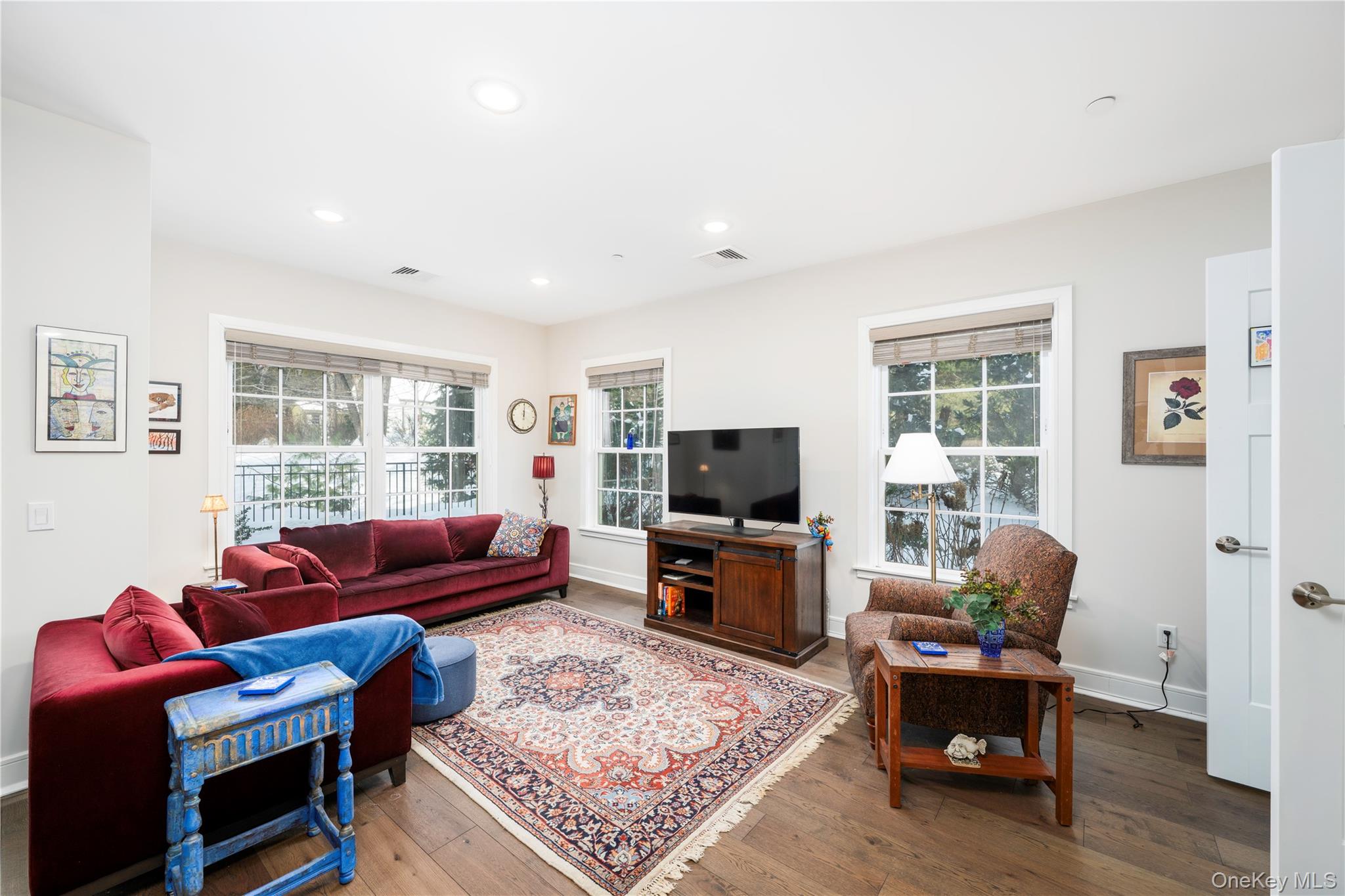 19 Butterfield Road, Unit 102B Cold Spring, NY 10516 - Photo 5 of 20 Living room leads to the office space with double doors.