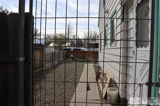 a front view of a house with a outdoor space