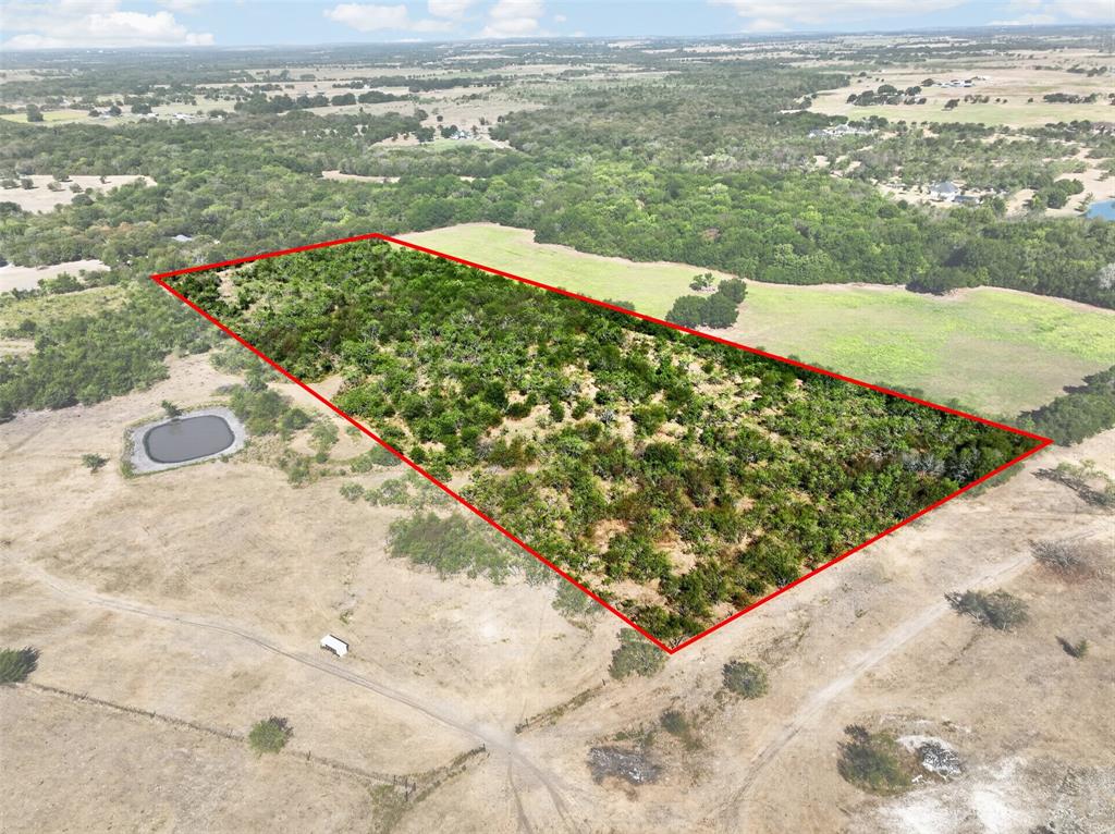 0 Novy Road Ennis, TX 75119 - Photo 5 of 25 Expansive lot featuring a natural pond and surrounding undeveloped land