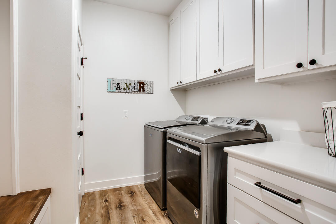 4106 124th Street Lubbock, TX 79423 - Photo 26 of 30 a view of a stove and microwave