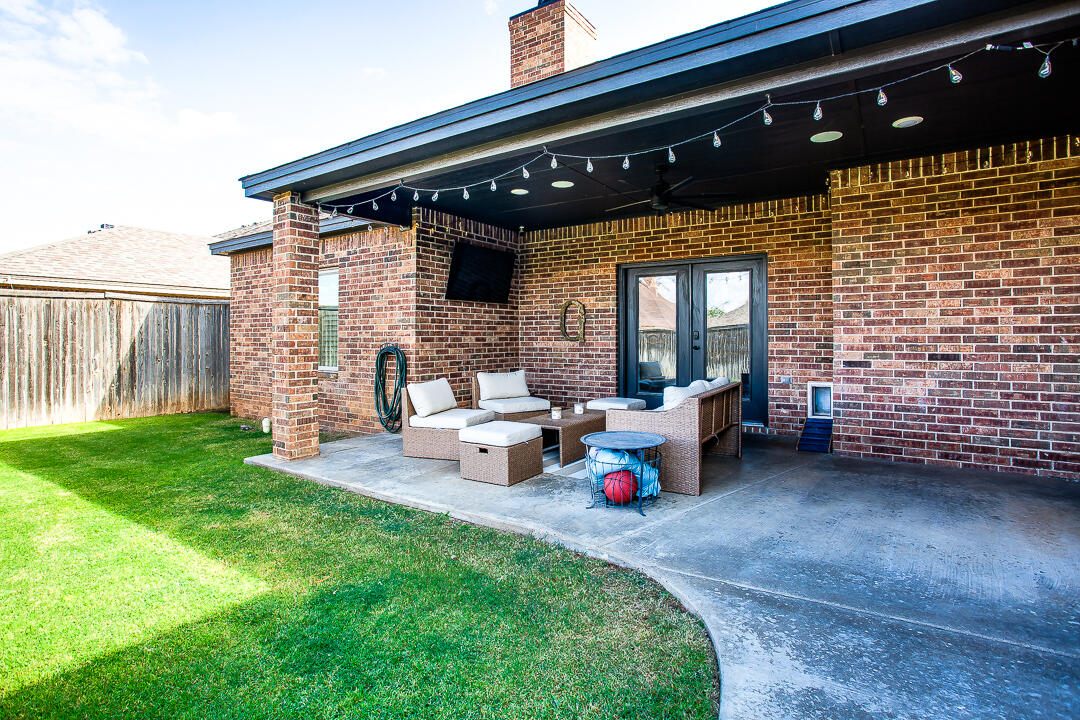 4106 124th Street Lubbock, TX 79423 - Photo 30 of 30 a backyard of a house with seating space