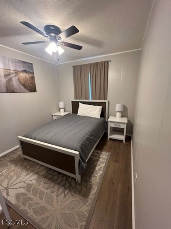 651 Hunting Club Avenue Clewiston, FL 33440 - Photo 6 of 9 a spacious bedroom with a bed and cabinet