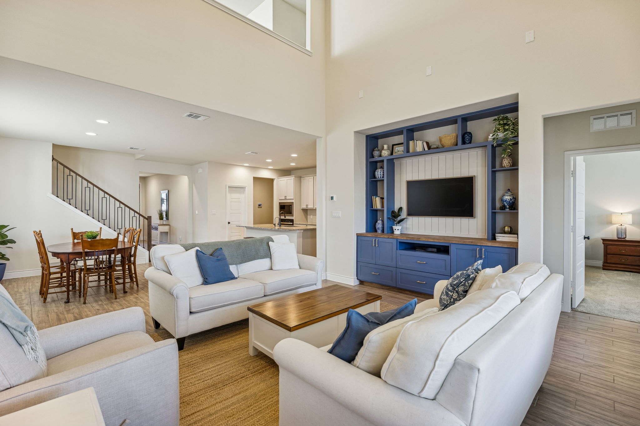 4008 Wild Bloom Road Seguin, TX 78155 - Photo 1 of 1 a living room with furniture and a flat screen tv