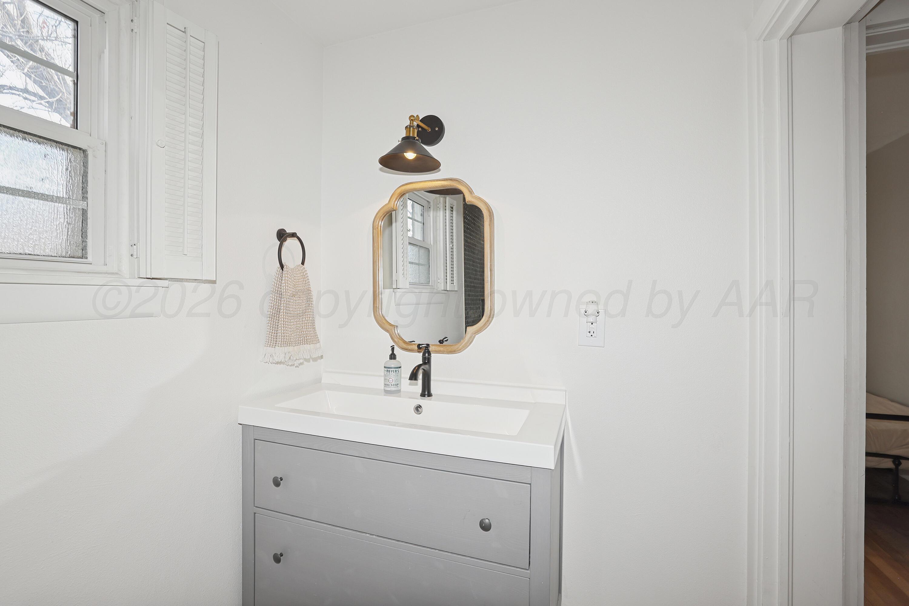2102 South Hayden Street Amarillo, TX 79109 - Photo 30 of 37 33-Upstairs Bathroom Vanity
