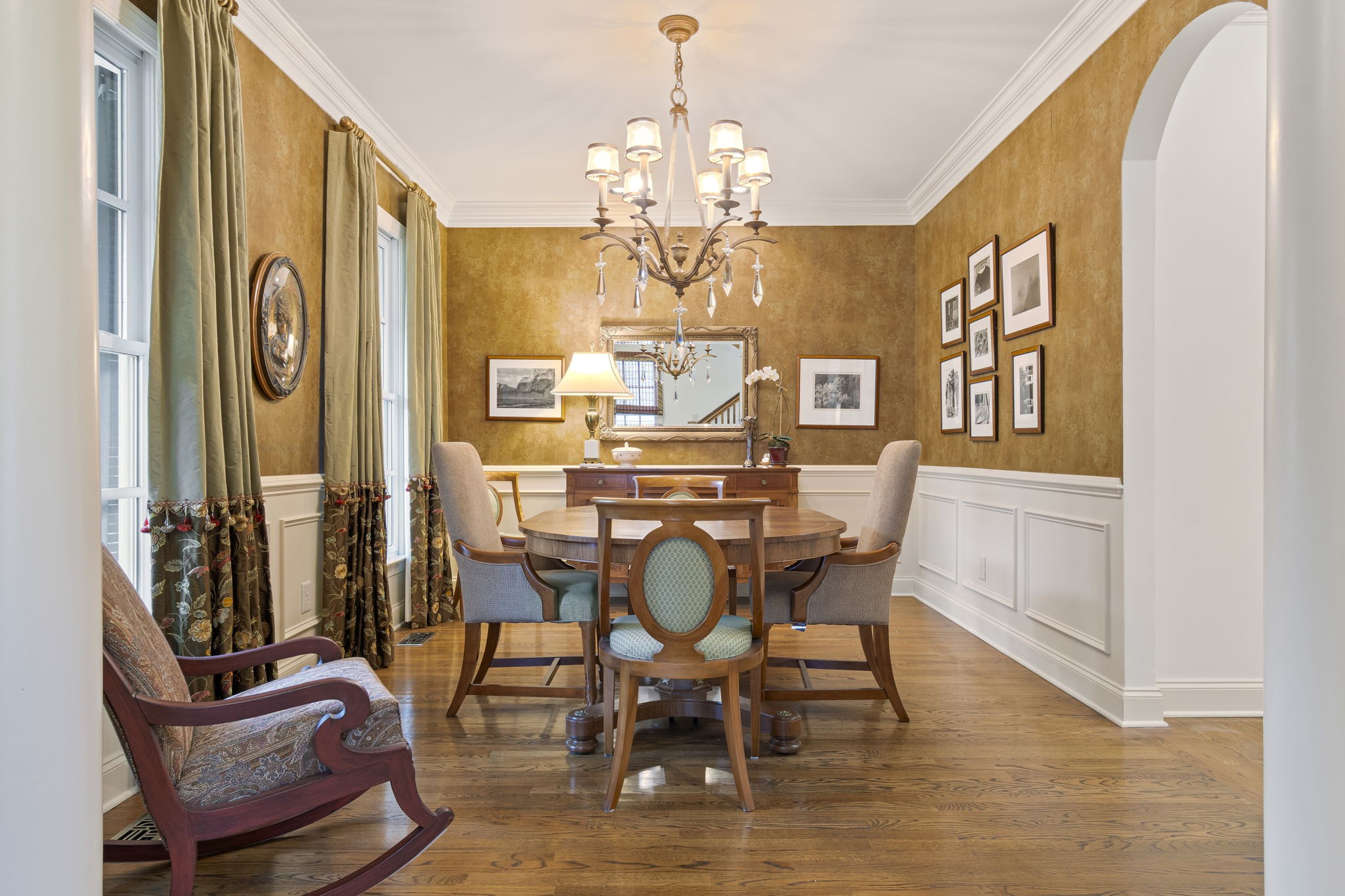 713 Pearre Springs Way Franklin, TN 37064 - Photo 15 of 95 a dining room with furniture a chandelier and wooden floor