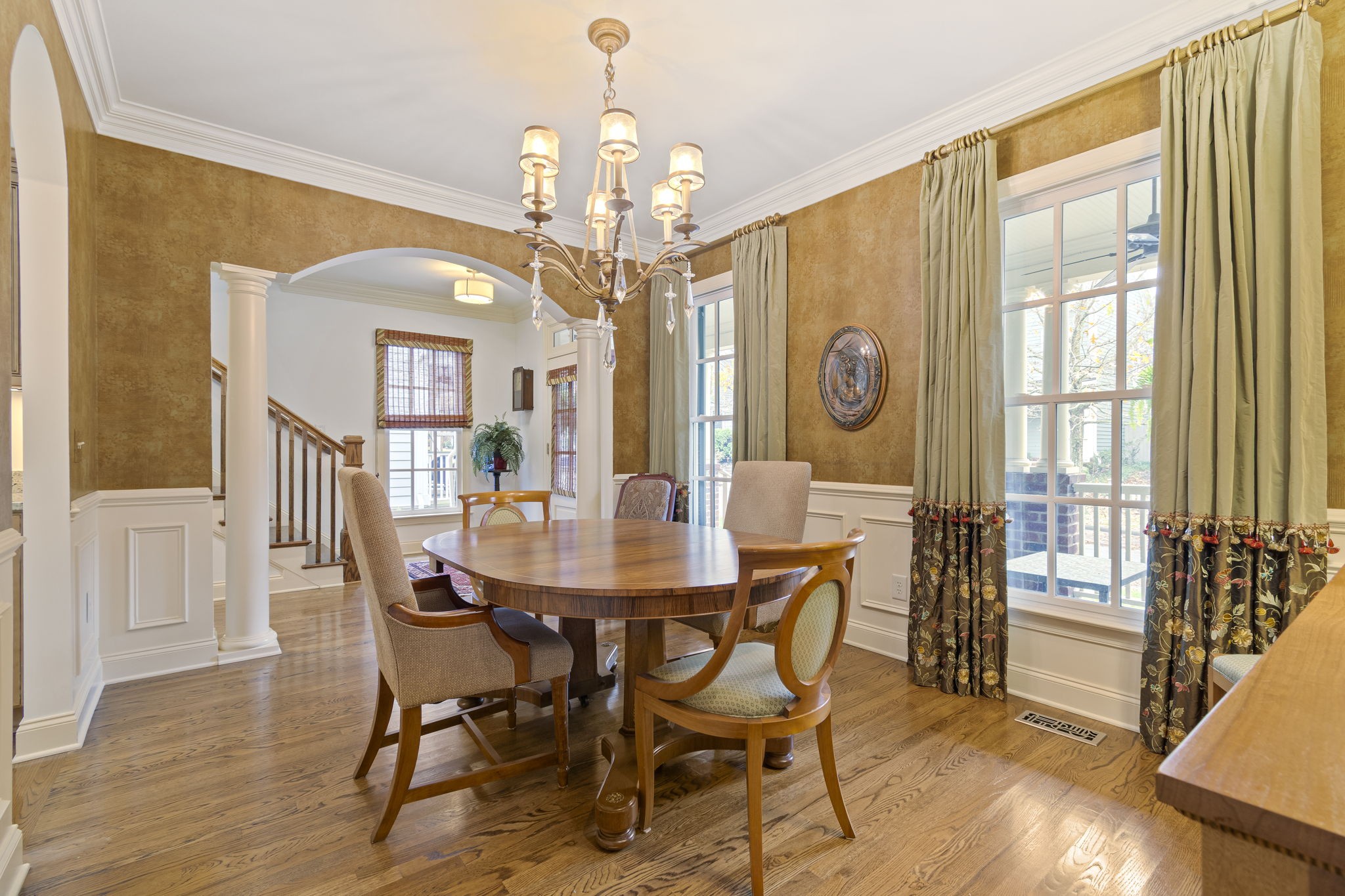 713 Pearre Springs Way Franklin, TN 37064 - Photo 17 of 95 a view of a dining room with furniture window and wooden floor