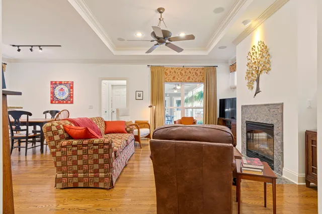 a dining room with stainless steel appliances furniture a dining table and kitchen view