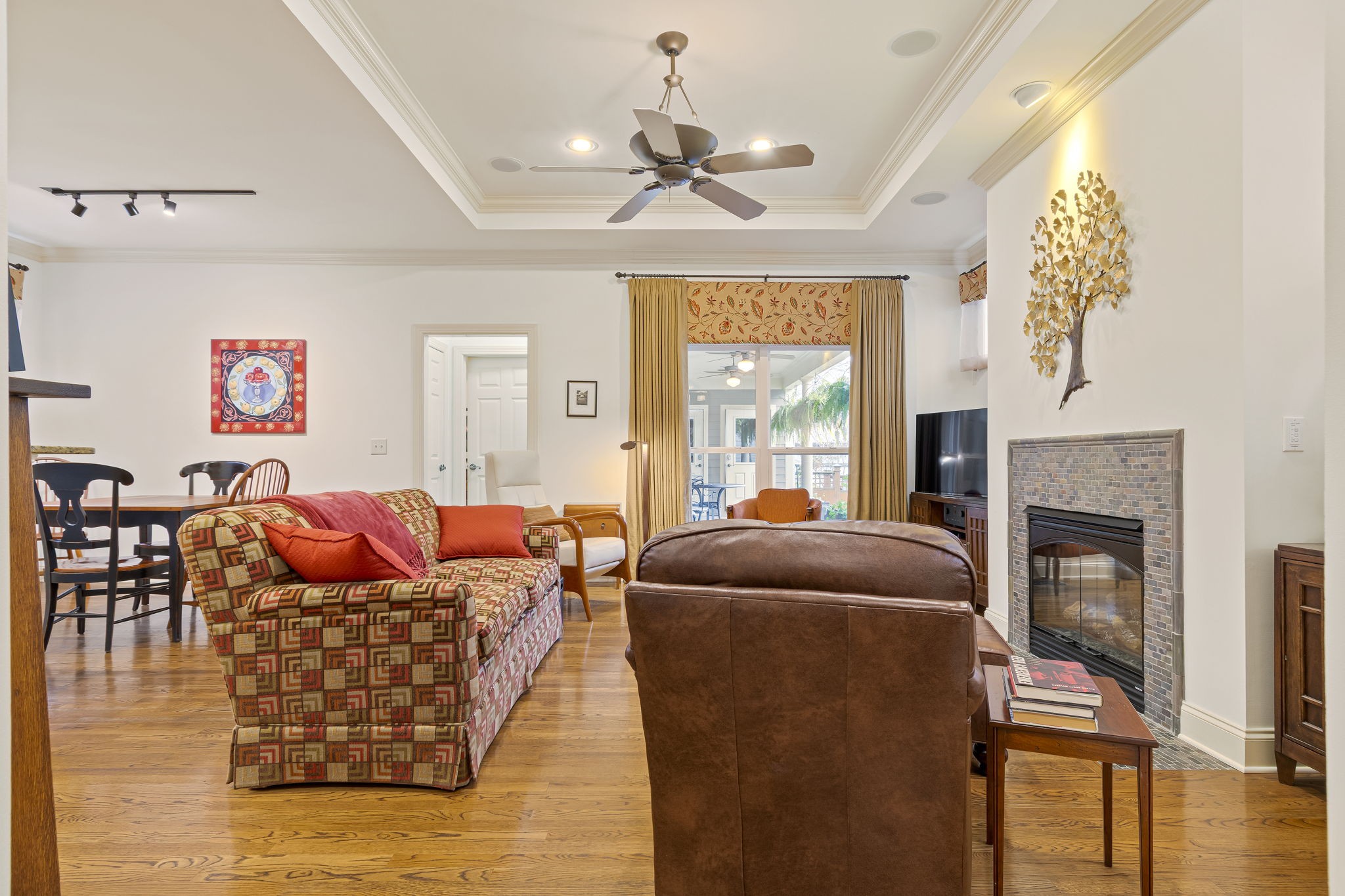 713 Pearre Springs Way Franklin, TN 37064 - Photo 20 of 95 a living room with furniture a fireplace and a chandelier