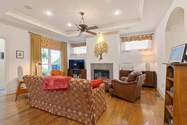 a view of a dining room with furniture and wooden floor