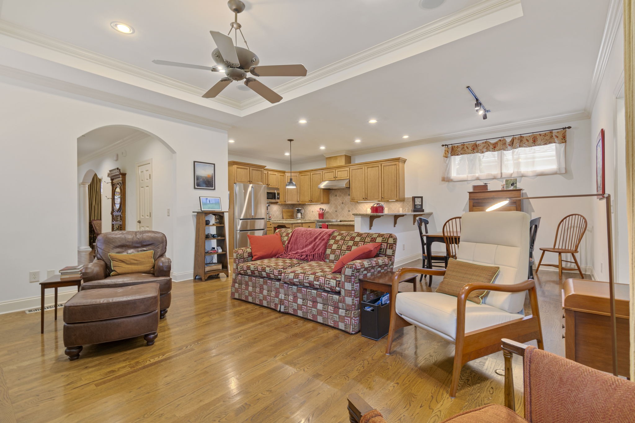 713 Pearre Springs Way Franklin, TN 37064 - Photo 26 of 95 a living room with furniture and a chandelier