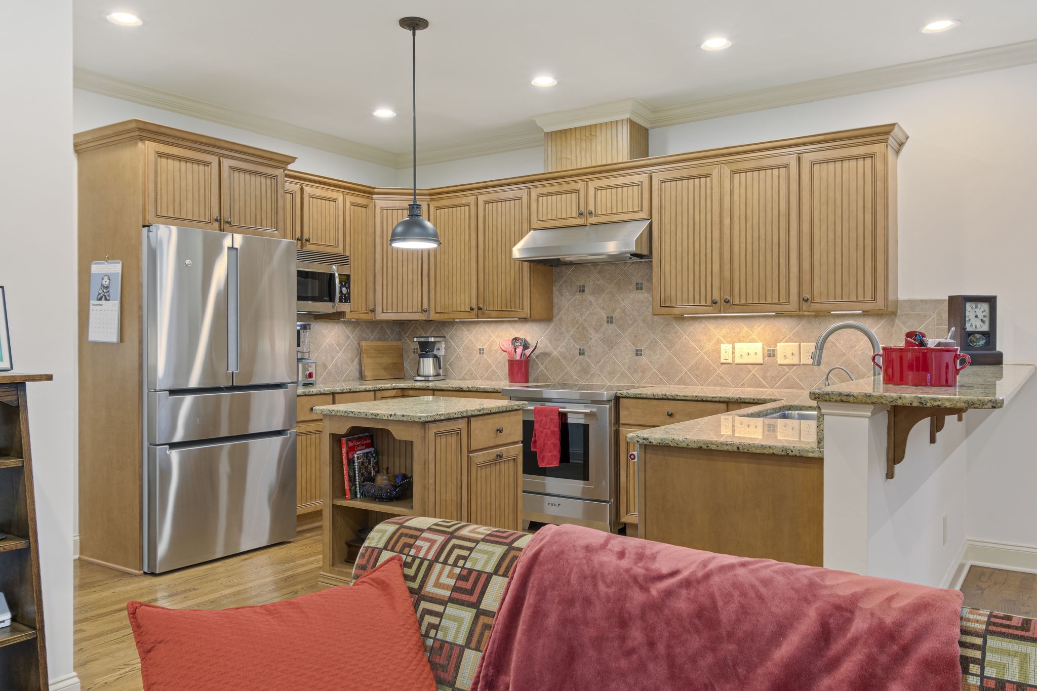 713 Pearre Springs Way Franklin, TN 37064 - Photo 29 of 95 a kitchen with stainless steel appliances granite countertop a refrigerator sink and cabinets