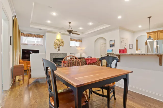 a picture of a room with a ceiling fan