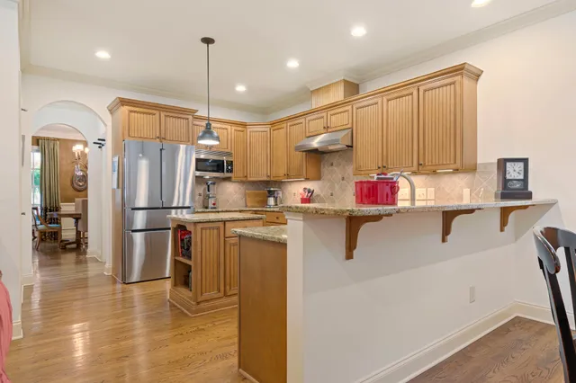 a view of a bench in front of house