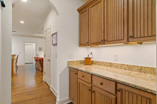 a view of a livingroom with an empty space and a window