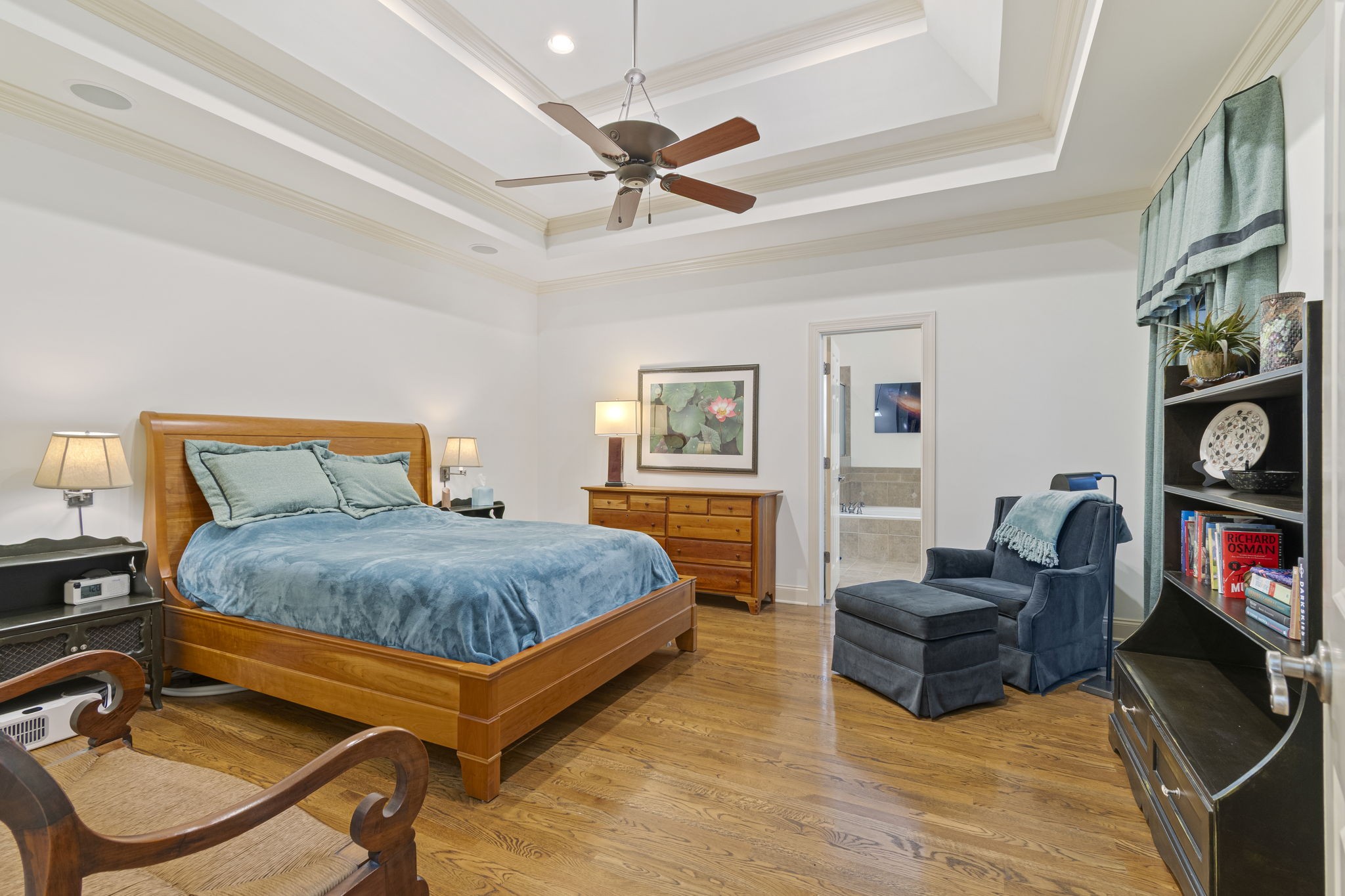 713 Pearre Springs Way Franklin, TN 37064 - Photo 54 of 95 a bedroom with a bed and wooden floor