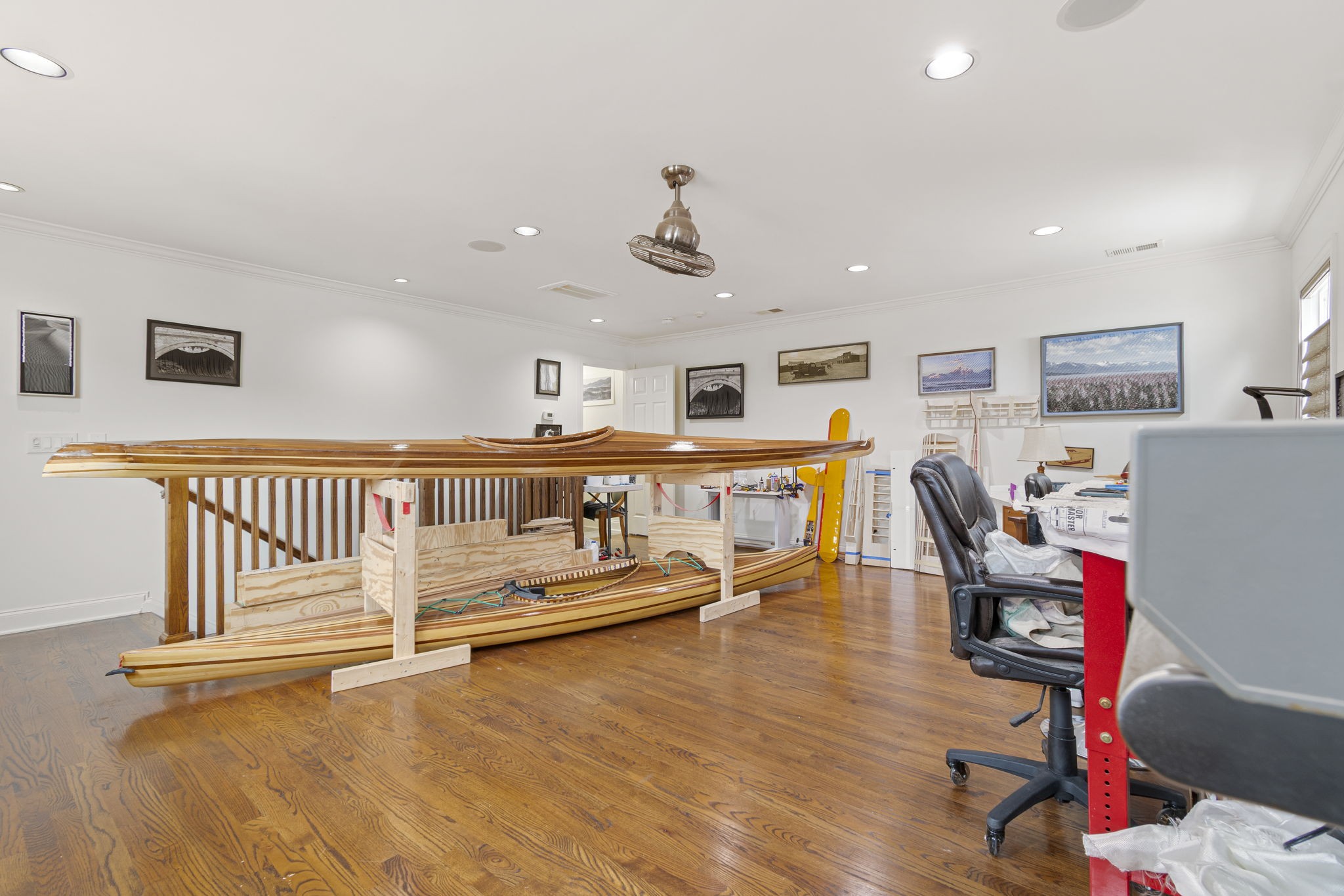 713 Pearre Springs Way Franklin, TN 37064 - Photo 69 of 95 a view of a workspace with furniture and a living room