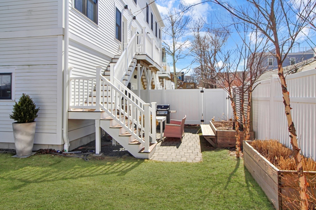 10 Berkley Road, Unit A Hull, MA 02045 - Photo 23 of 25 a view of a house with backyard and sitting area