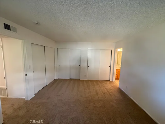 a bathroom with a sink toilet and mirror