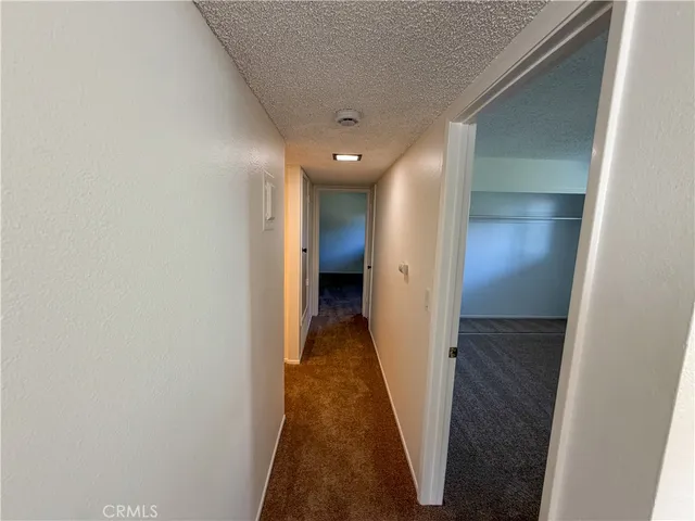 a kitchen with a cabinets and a stove top oven