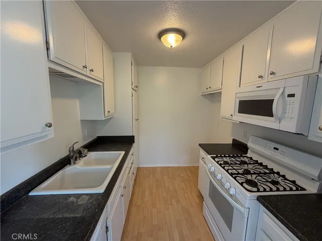 a view of an empty room and entryway