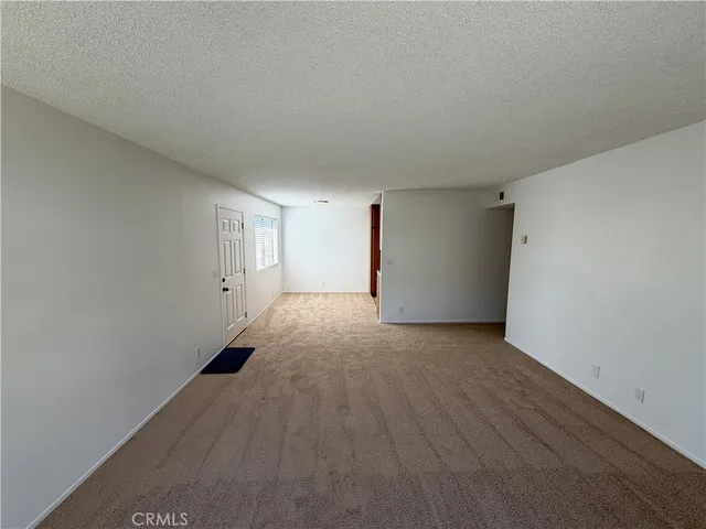 a view of a kitchen with a sink