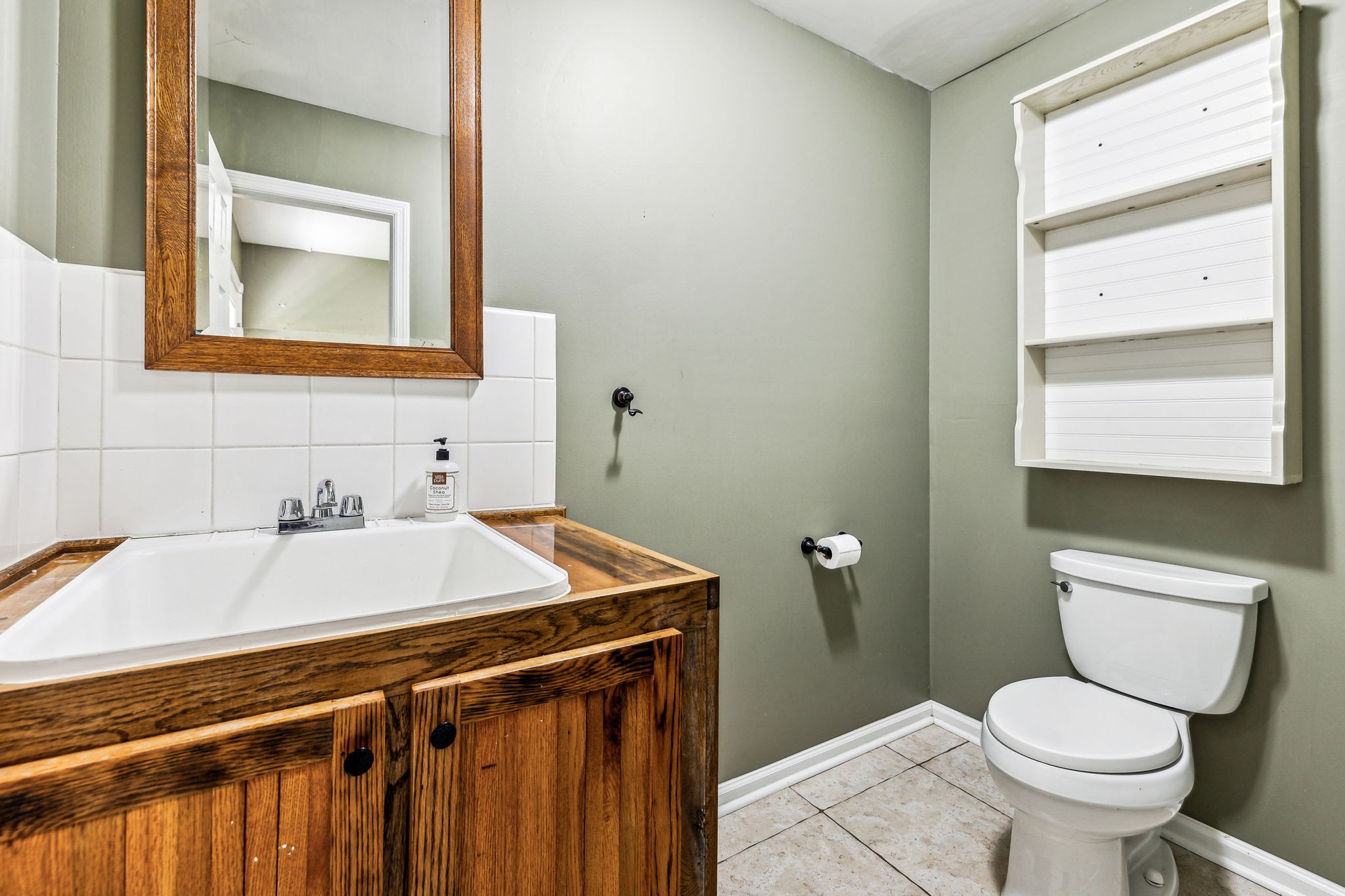 915 Woosley Road Tullahoma, TN 37388 - Photo 28 of 70 This is the sink and toilet area of the Mud Room