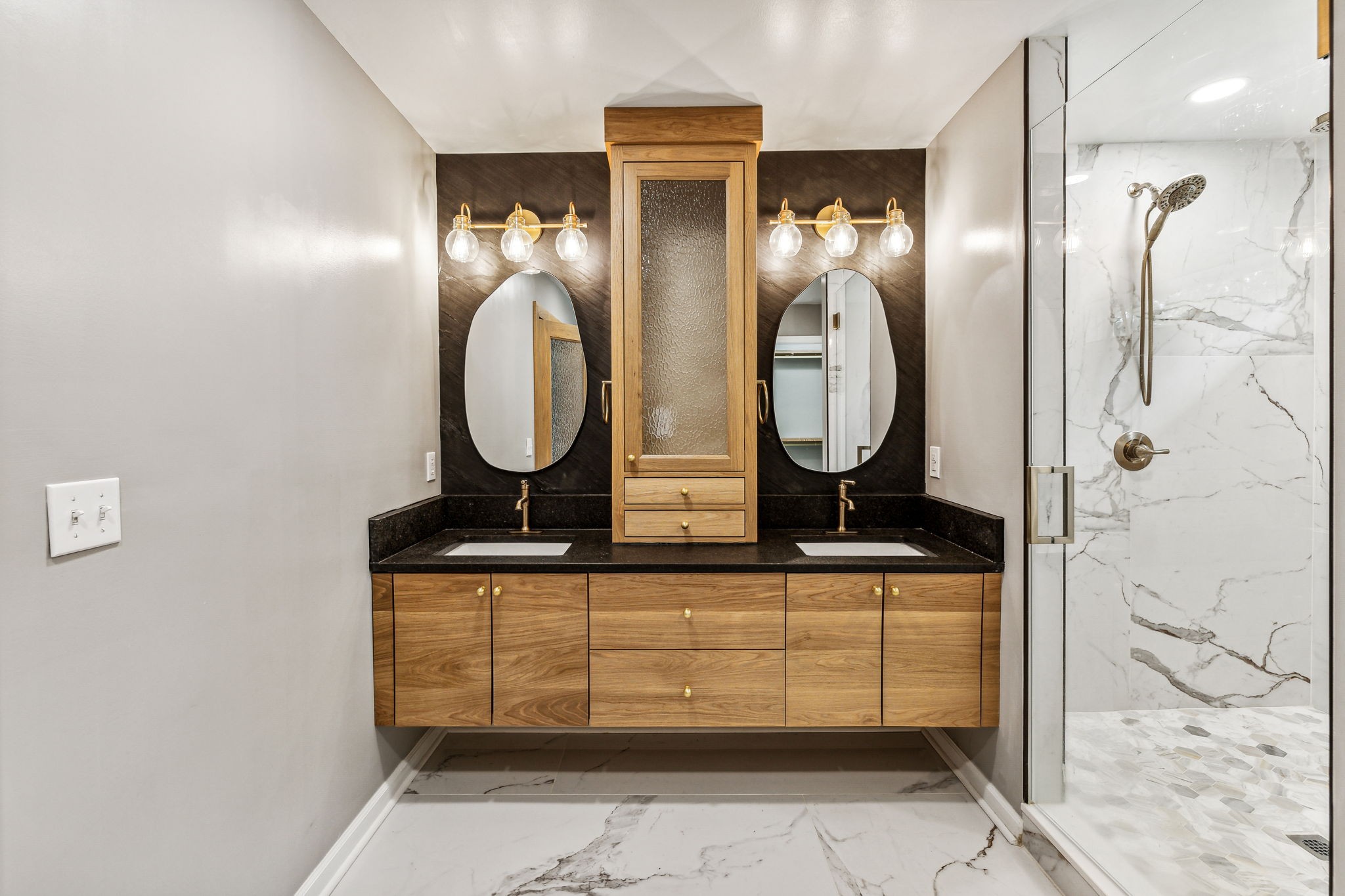 915 Woosley Road Tullahoma, TN 37388 - Photo 47 of 70 Look at the modern vanity in the Master Bath. Double sinks, modern mirrors, plenty of storage and lighting set it off perfectly