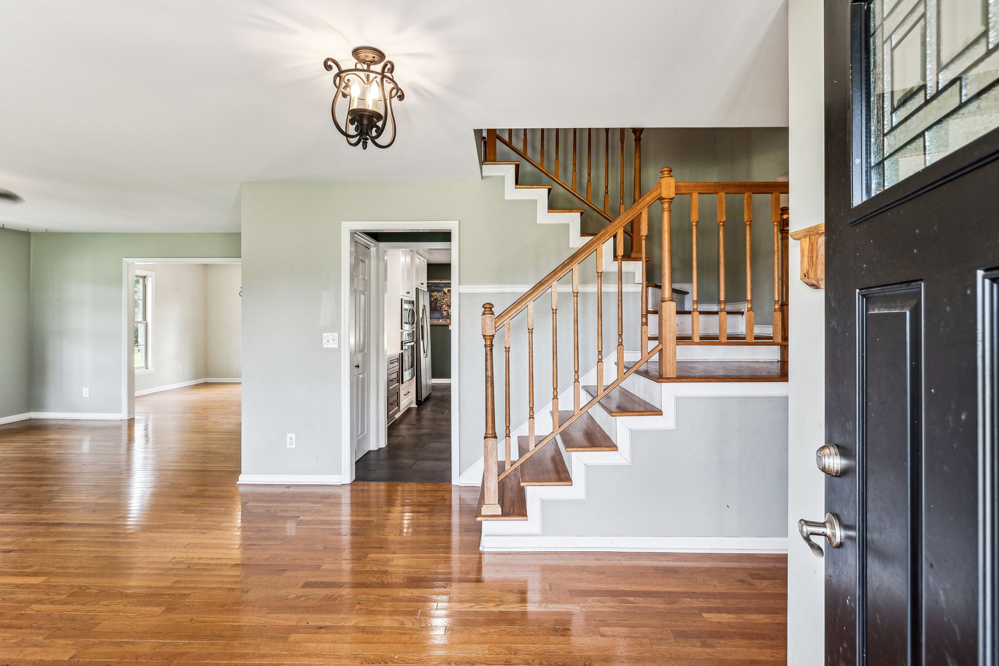 915 Woosley Road Tullahoma, TN 37388 - Photo 8 of 70 Walk in to a Den with fireplace, hardwood floors, and views from all the windows of this great property.