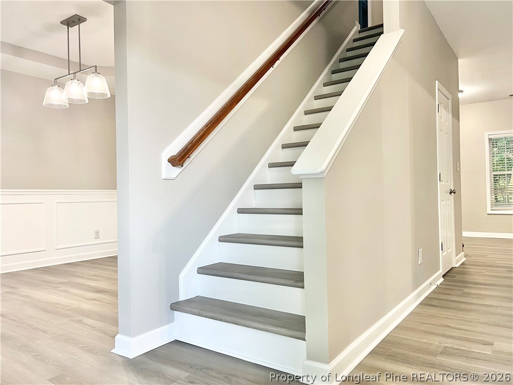1523 Rough Rider Lane Parkton, NC 28371 - Photo 3 of 42 a view of entryway and hall with wooden floor