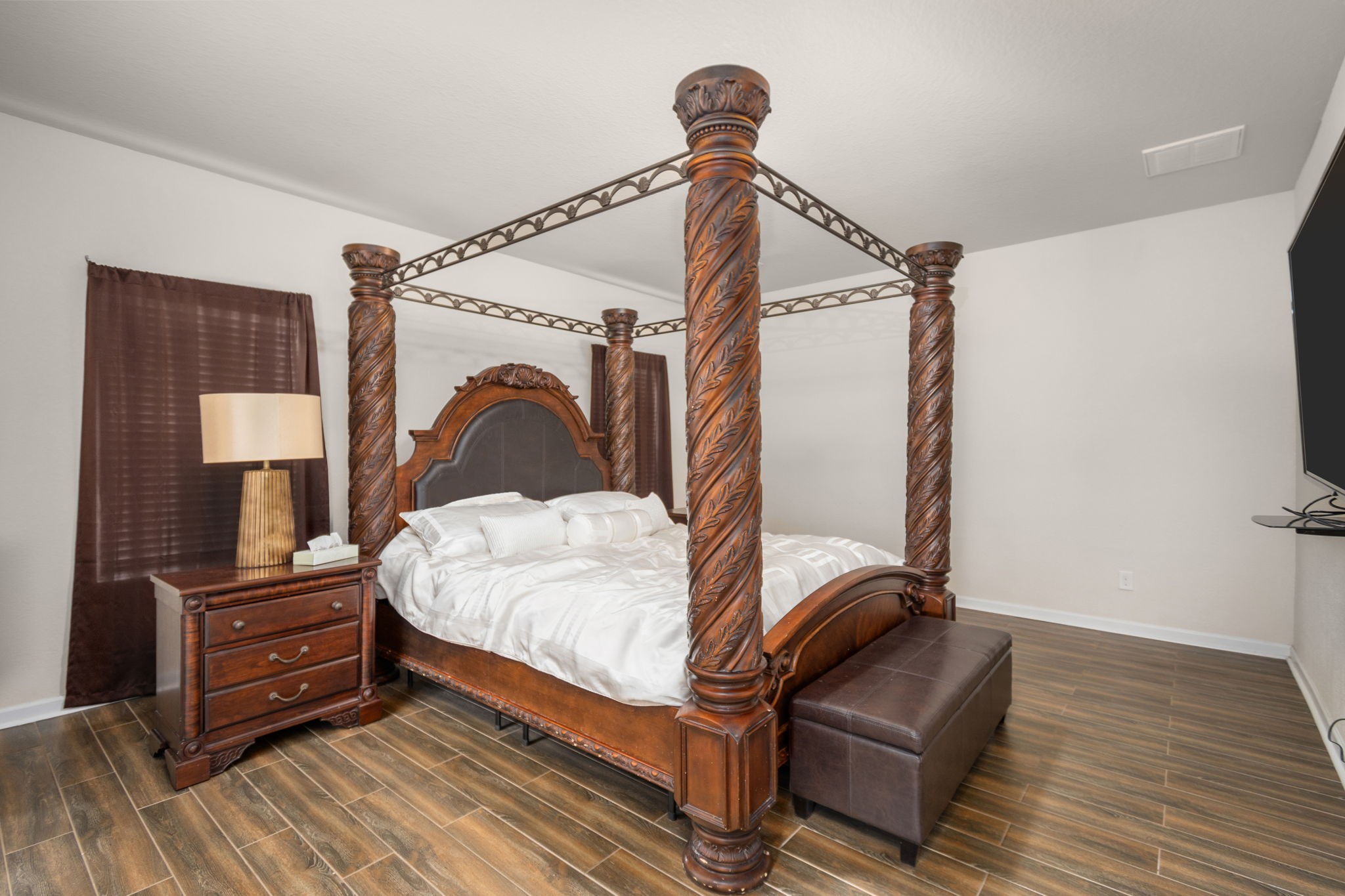2702 Elm Crossing Trail Spring, TX 77386 - Photo 10 of 21 a bedroom with a bed and wooden floor