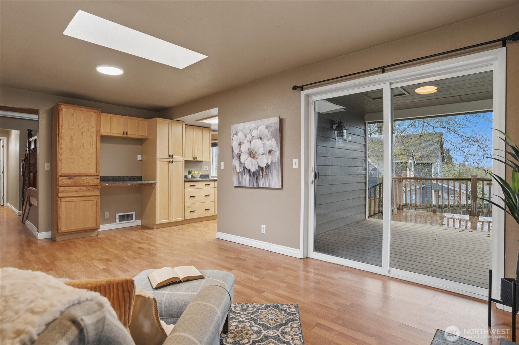 19855 Stavanger Loop Northeast Poulsbo, WA 98370 - Photo 8 of 37 a living room with stainless steel appliances furniture and a kitchen view