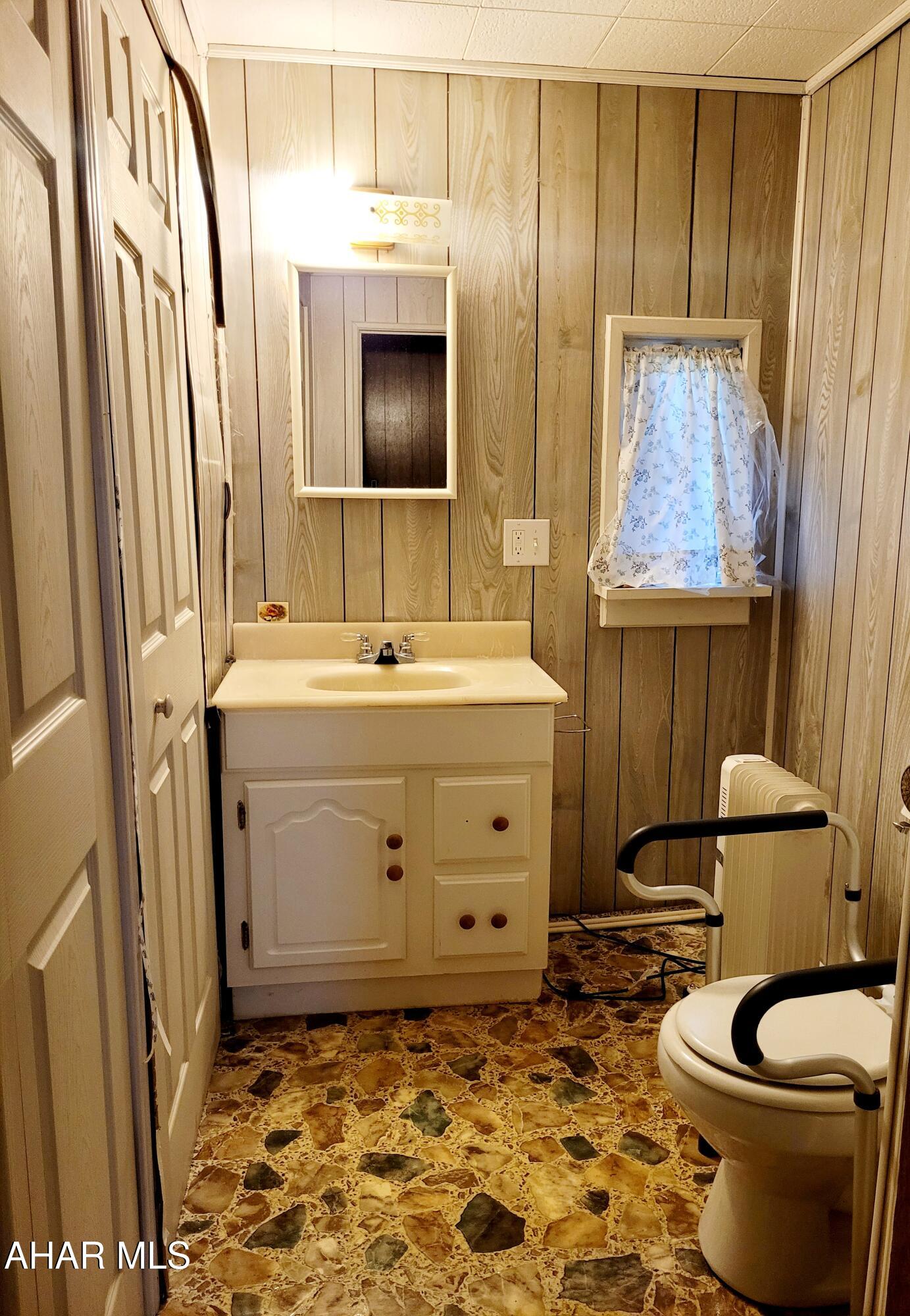 199 Reeds Lane Altoona, PA 16601 - Photo 19 of 25 Half bath in the bedroom hallway