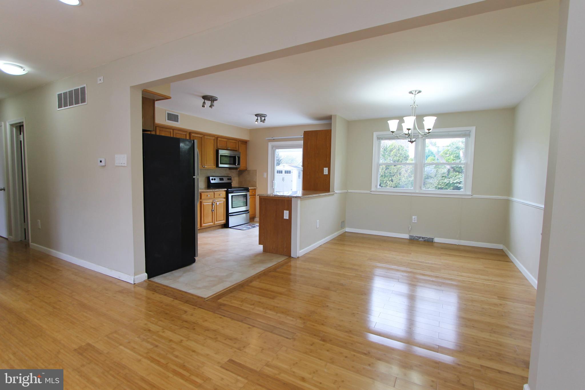 617 Renz Street Philadelphia, PA 19128 - Photo 1 of 28 a view of a kitchen cabinets and wooden floor