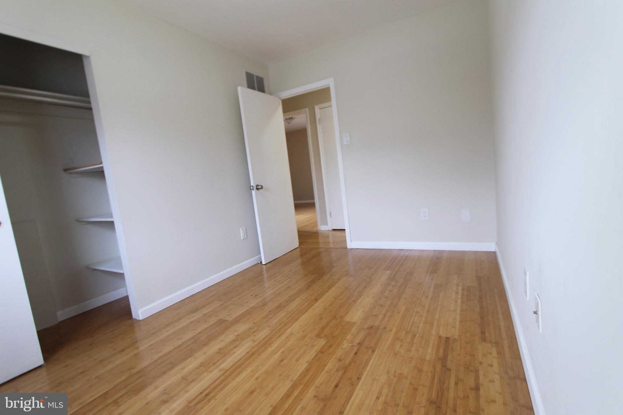 617 Renz Street Philadelphia, PA 19128 - Photo 13 of 28 a view of an empty room with wooden floor and a window