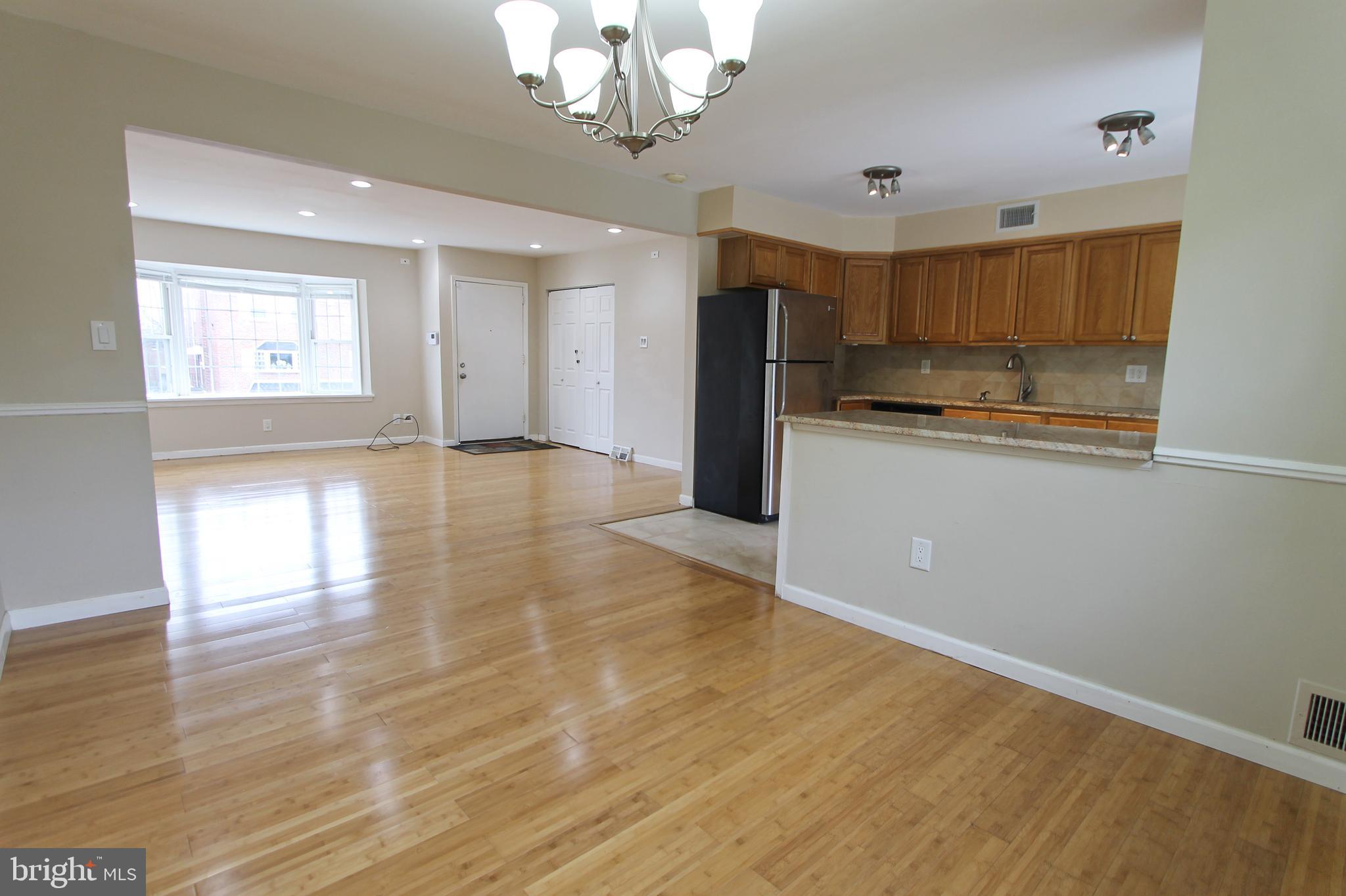 617 Renz Street Philadelphia, PA 19128 - Photo 15 of 28 a view of a kitchen with a sink and dishwasher a refrigerator with wooden floor