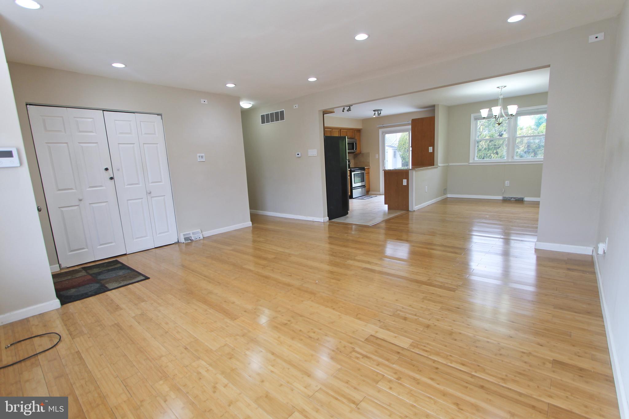 617 Renz Street Philadelphia, PA 19128 - Photo 24 of 28 a view of an empty room with wooden floor and a bathroom