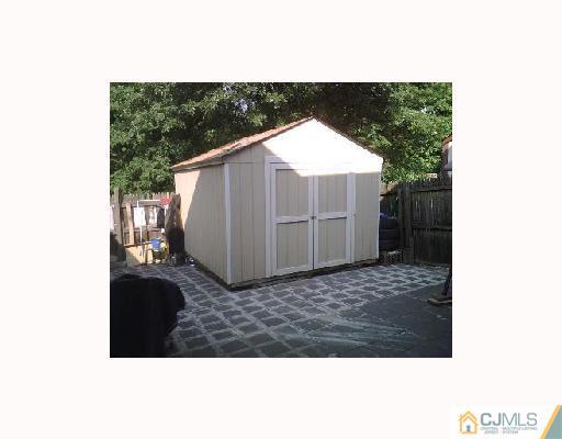 63 Redbud Road Piscataway, NJ 08854 - Photo 4 of 6 a view of outdoor space and yard