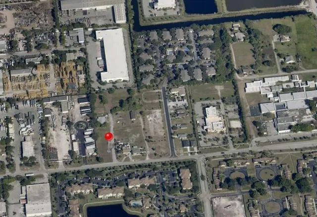 view of a bathroom with a shower and a sink