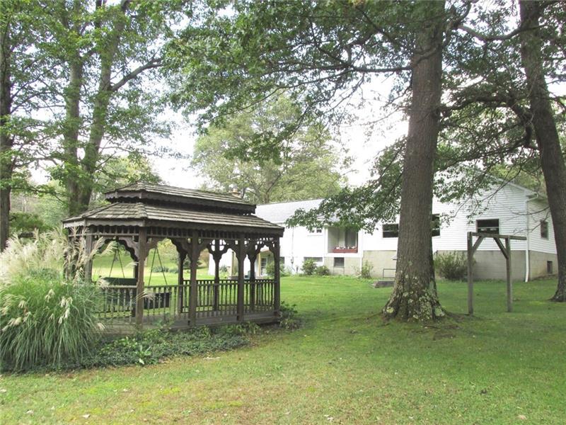 380 Dillon Road Acme, PA 15610 - Photo 21 of 25 Backyard Shaded from the afternoon sun this has been a favorite gathering place for get-togethers!