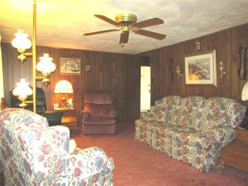 380 Dillon Road Acme, PA 15610 - Photo 8 of 25 Where you see the bright light is the kitchen where we just came from.