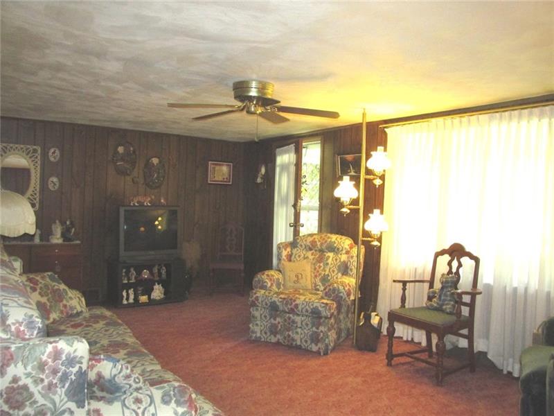 380 Dillon Road Acme, PA 15610 - Photo 9 of 25 As this entry opens right into the living room, the entry by the den is the one most often used.