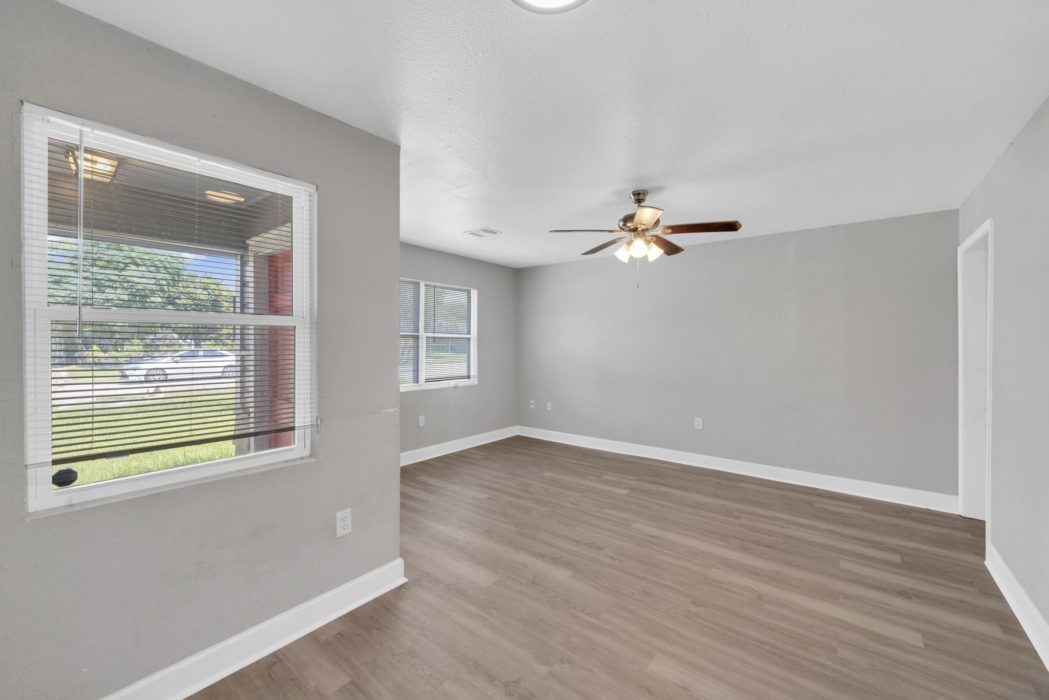 12358 Mylla Street Houston, TX 77015 - Photo 2 of 17 a view of a livingroom with a ceiling fan and window
