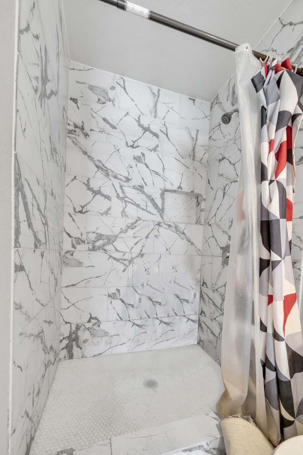 12358 Mylla Street Houston, TX 77015 - Photo 7 of 17 a bathroom with a bathtub and shower