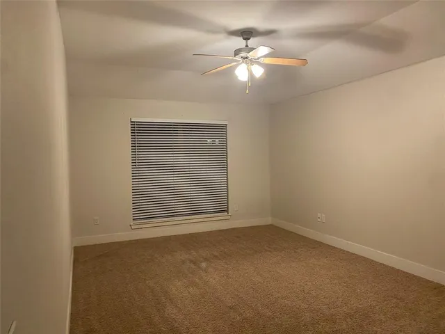 a view of a room with a window