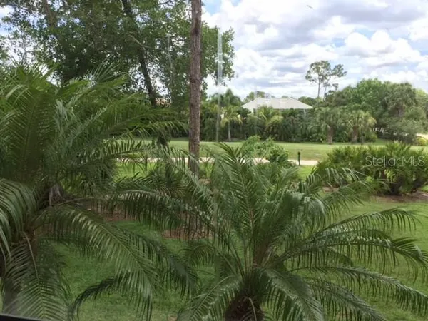 a view of a lake view with a garden