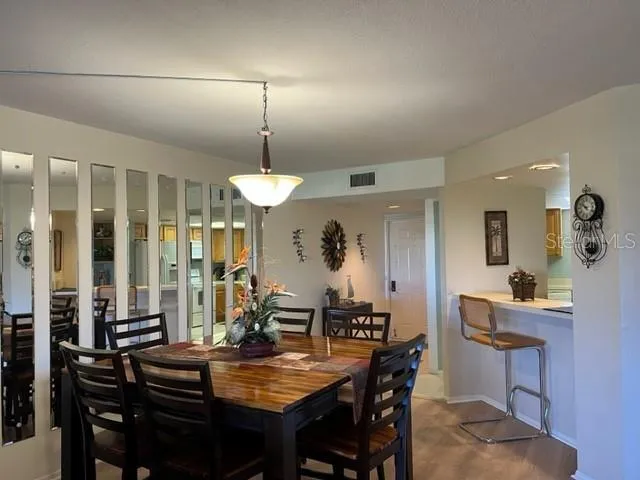 a view of a dining room with furniture